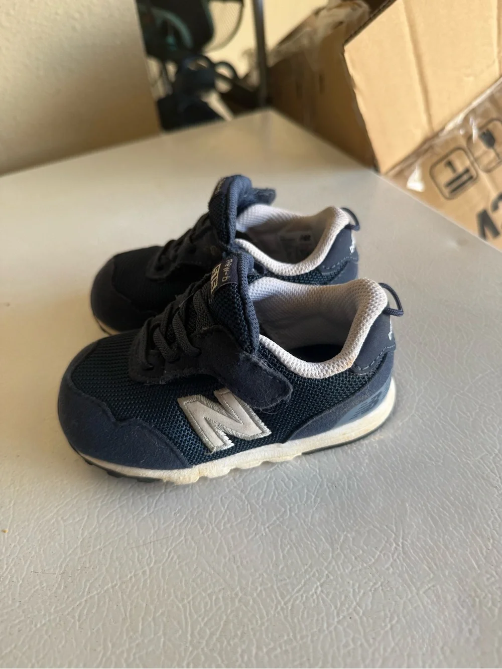New Balance Kids Navy and White Sneaker
